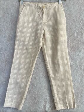 Cream plaid pants feature an elastic waistband with a drawstring (SKU708)
